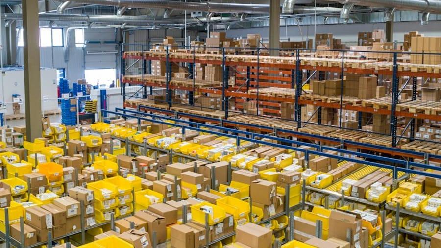 Crates and pallets being handled at a distribution depot