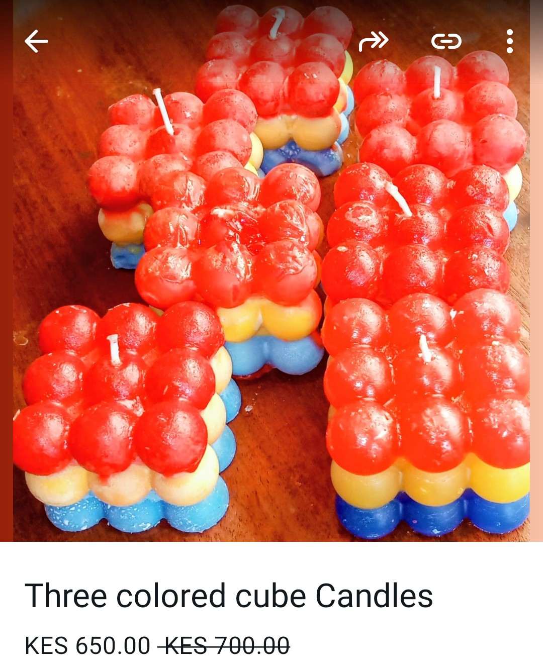 Three coloured cube candles